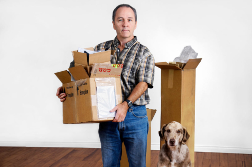 A man, his belongings, and his dog