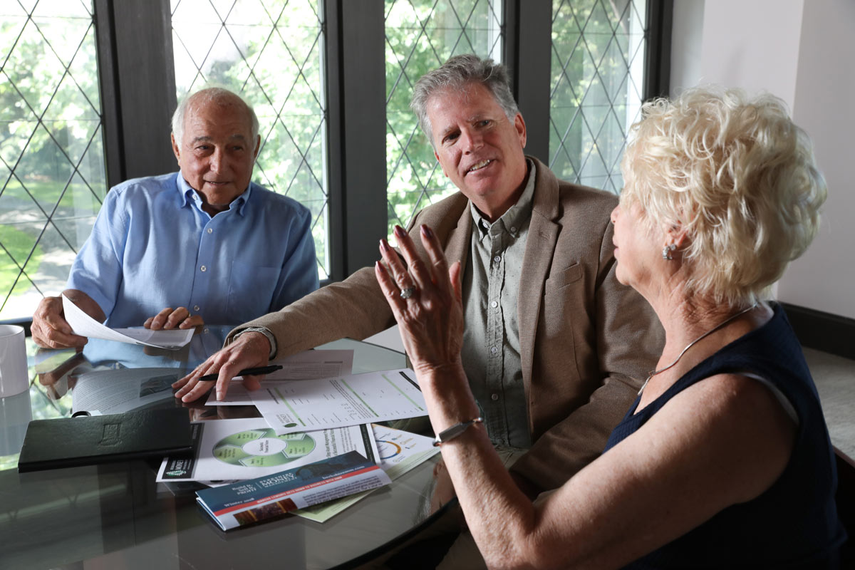 Financial Advisor Peter Coughlin of Berkshire Money Management guides a couple through the estate planning process