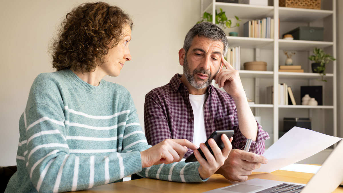 A couple in their fifties reviewing inheritance options